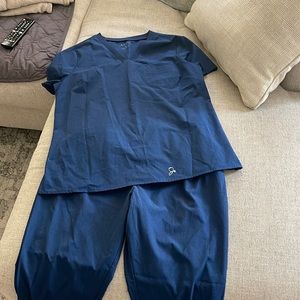 Jaanuu navy scrub set. Top M, bottom M